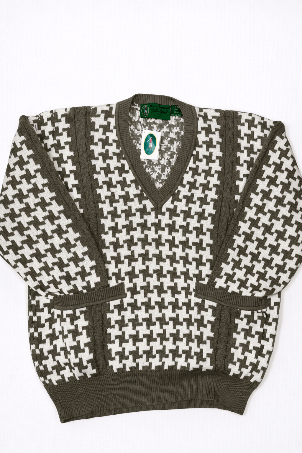 Houndstooth pattern sweater with a brand label on a white background