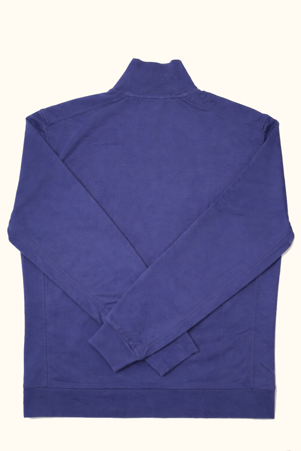 Blue Ralph Lauren golf quarter zip sweater on a white background