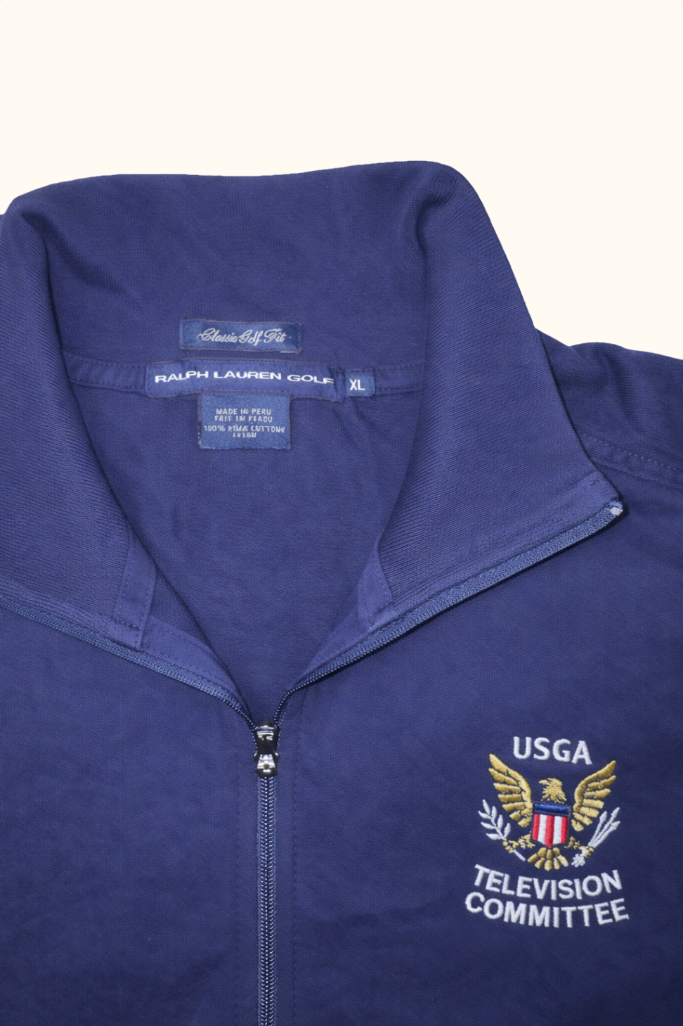 Navy blue jacket with Ralph Lauren Golf logo and USGA Television Committee emblem on a white background