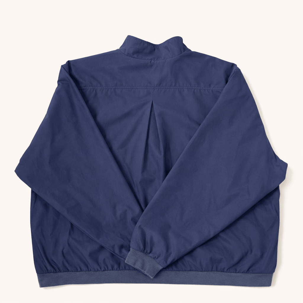 Blue pullover with a quarter zip back