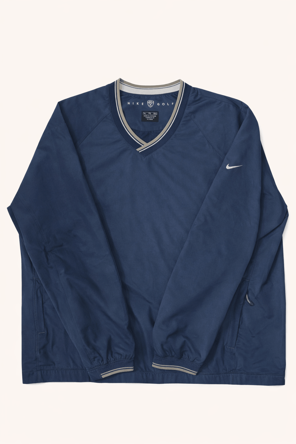 Blue sweater with Nike logo on a white background